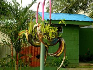 Old tires cut into sections and painted to look like Toucans.