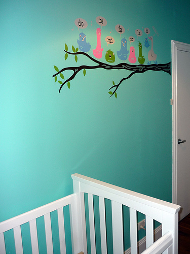 Stickers or decals can add charm to a plain wall.