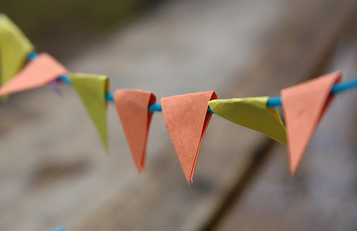 Mini bunting made from scraps of paper and cotton.