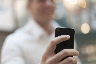 Smartphone in Hands of Businessman