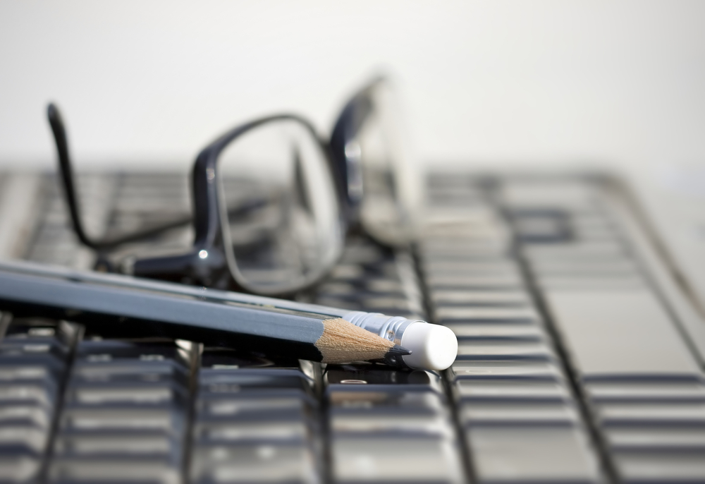 Laptop and Glasses - Courtesy of Shutterstock