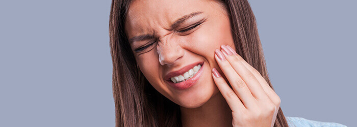 What Are The Warning Signs & Symptoms Of Periodontal Disease?